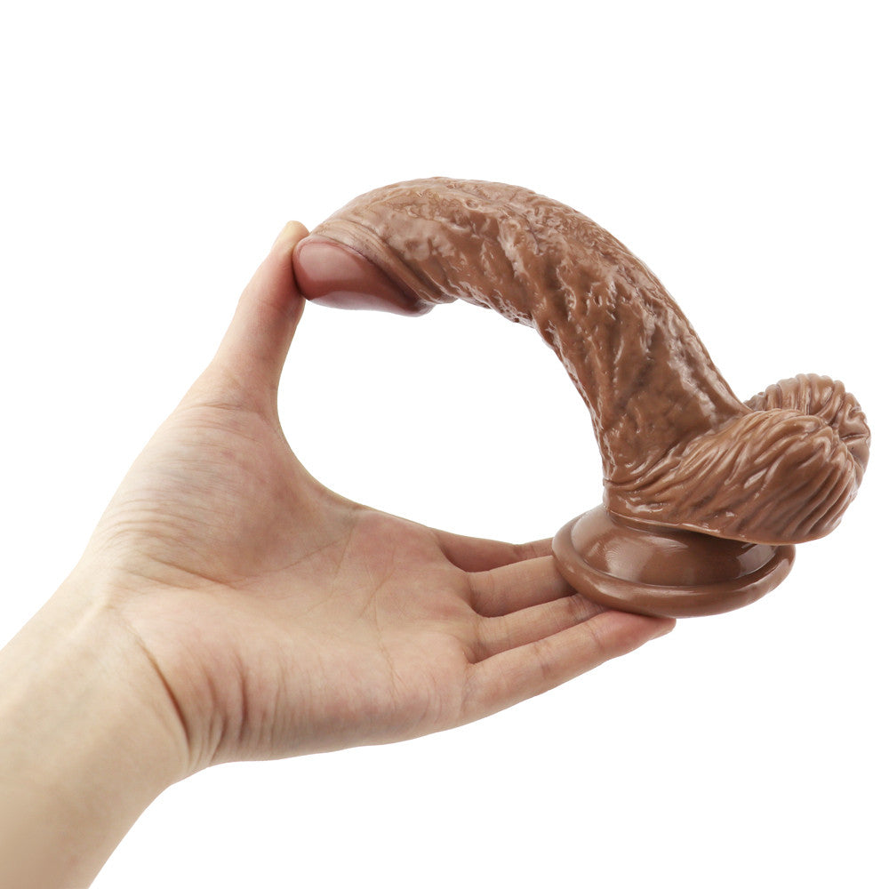 Brown curved dildo