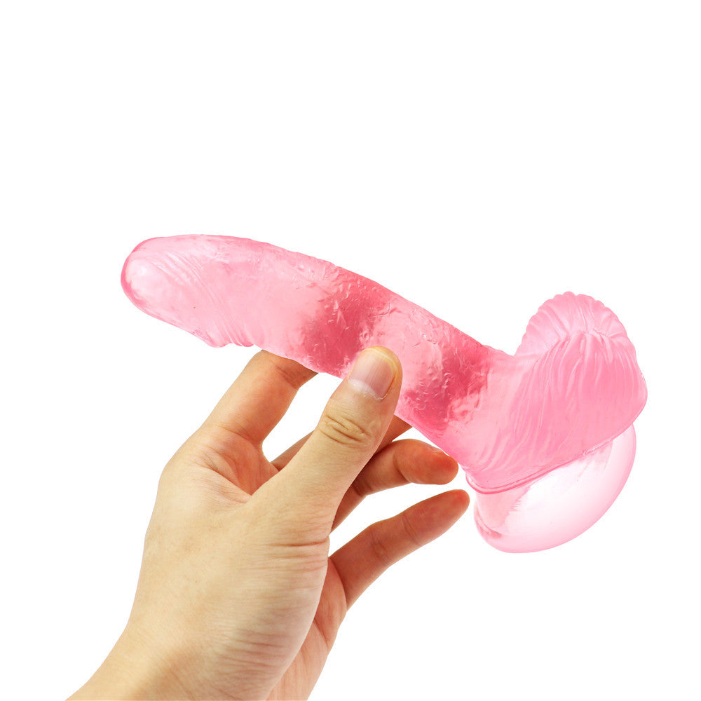 Pink curved dildo